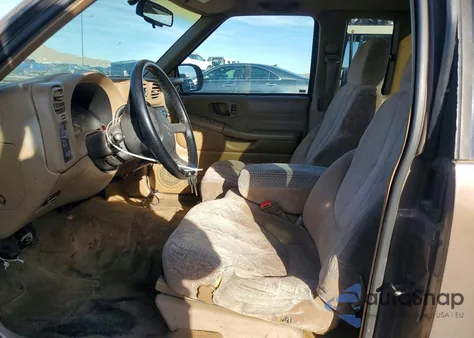 1999 GMC Sonoma z USA, uszkodzony, nr VIN 1GTCS19X7X8510970